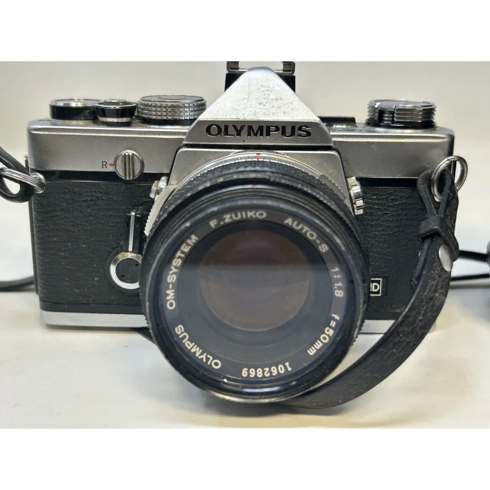 Olympus OM-1 35mm Film Camera w/ F.Zuiko 50mm f/1.8 + Fotomat 28–80mm Lens